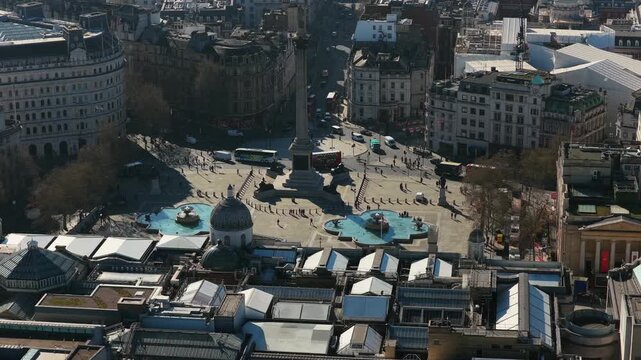 High altitude survey of Trafalgar Square, Nelson's Column, National Gallery, famous London landmark with urban traffic and historic architecture in Westminster