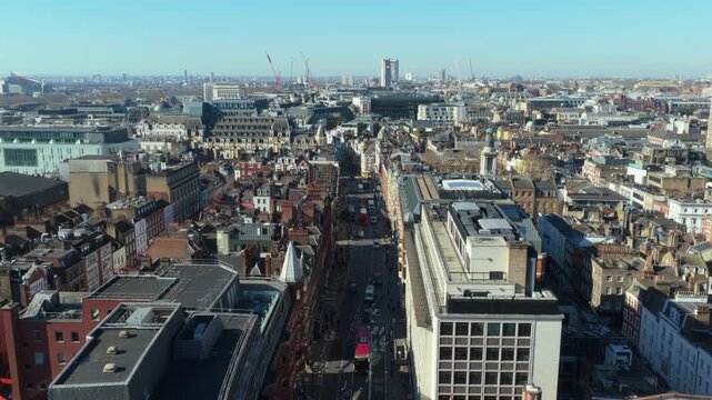 Aerial survey above Regent Street St James's in London's West End, showcasing historic architecture, busy urban life, and expansive capital city skyline