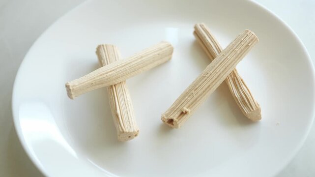 Stick sugar, an ancient Thai dessert. It has a sweet taste from sugar made from sugar cane