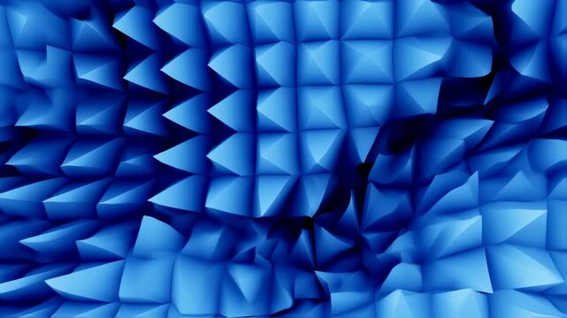 Abstract blue geometric surface, composed of small pyramid structures, forming a wavy relief