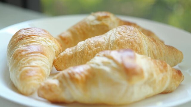 Very Close Up Shot of freshly baked croissants fragrant from the oven Freshly made by the chef is one of the breakfast bakery menus in the hote