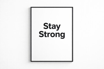 Minimalist poster with the motivational phrase Stay Strong in bold black letters