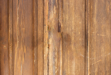 Obraz premium Natural wooden surface background with horizontal and vertical timber planks and rustic brown wood grain texture pattern for table top or wall paneling.