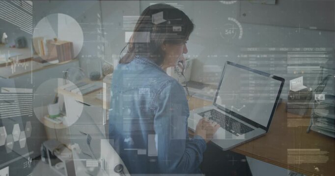 Animation of data processing over businessman using laptop