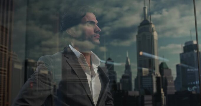 White Businessman in a Gray Suit Stands in a High-rise Office, Focused on Startup Planning and Financial Growth, Projecting Ambition, Entrepreneurial Confidence and a Subtle Successful Smile.