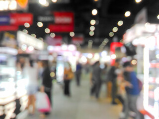 Blurred fair trade and people with colorful bokeh © Saranya
