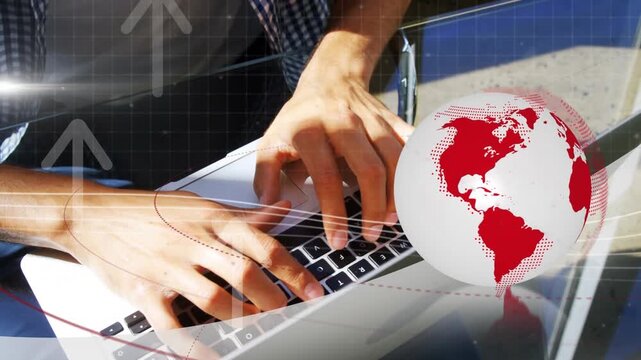Animation of arrows and globe over caucasian businessman using laptop in office