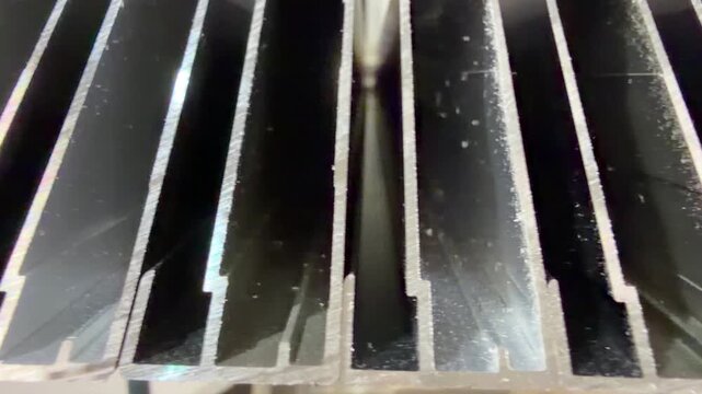 Alluminium moulding for furniture production, aluminium profile for the production of furniture facades made of aluminium. Close-up of ready-to-assemble parts.