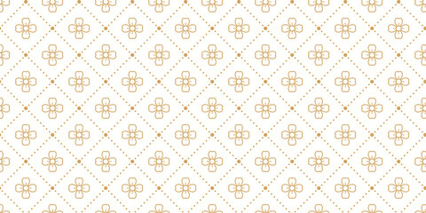 Fototapeta premium Elegant gold seamless luxury pattern with floral motifs and dotted rhombus lines on white. Perfect for premium branding.