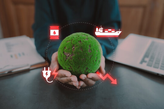 Business person holding globe with virtual oil barrel and cargo ship holograms for global energy crisis and Middle East geopolitical conflict concept, Impact Economy Risk, Petroleum shipping
