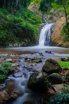 Jae son Waterfall, nestled in the lush greenery of the rainy season, is located in Jaeson National Park, Lampang Province, Thailand.