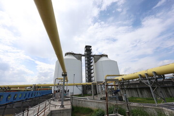 Fototapeta premium Twin Anaerobic Digestion Bioeactors for Renewable Energy Generation from Wastewater Sludge. Anaerobic Sludge Digesters for Biogas Production in a Municipal Wastewater Treatment Plant