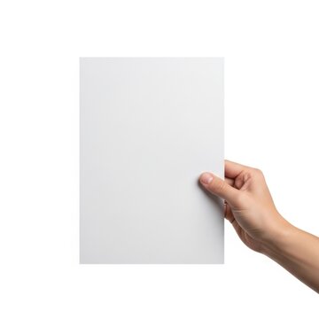 A hand holding a plain white sheet of paper against a plain background