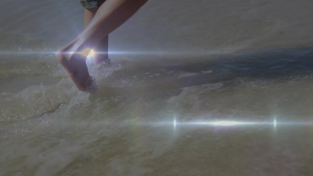 Animation of light spots over legs in water