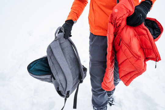 Organizing Winter Gear For Trek Restart. Getting Equipment Ready For Trek After Layering And Packing. Ensuring Proper Layering And Gear Exchange Before Continuing Winter Hike