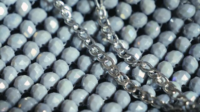 Close up of handmade beaded handbags. Trendy structured accessories combining unique design and elegant style for both casual and evening looks. High quality 4k footage