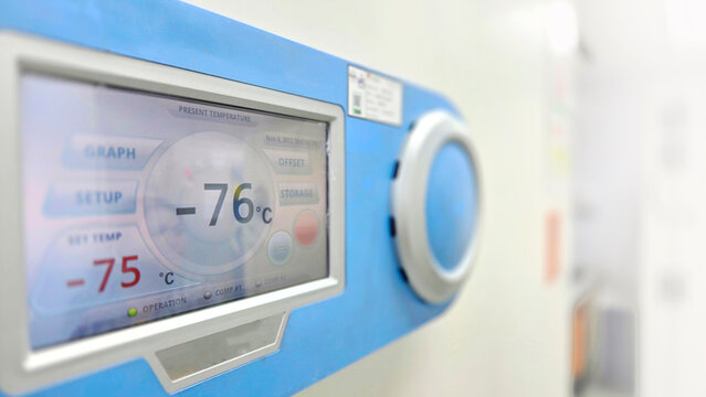 Selective focus of ultra low temperature -76 degree celsius freezer for keeping specimens for laboratory testing in hospital.Front of refrigerator storage blood from patient for research in university