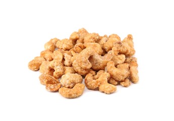 Fototapeta premium Heap of caramelized cashew nuts on white background.