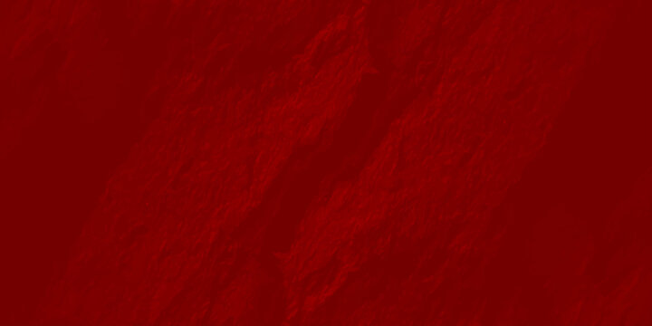 Deep red textured wall background with organic rough plaster surface and soft shadows