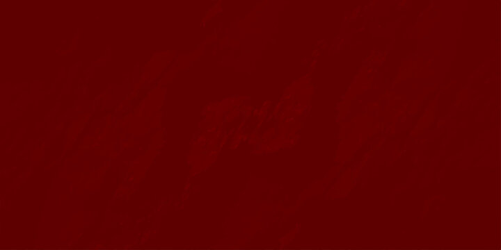 Deep red textured wall background with organic rough plaster surface and soft shadows