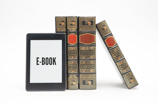 E-book reader device on desk in library