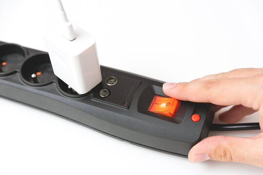 Power strip socket with connected plugs.