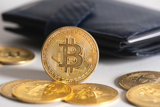 Cryptocurrency coins in wallet, Bitcoin, Ethereum