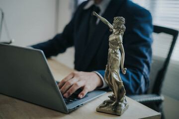 Fototapeta premium A lawyer in the courtroom with contract documents.