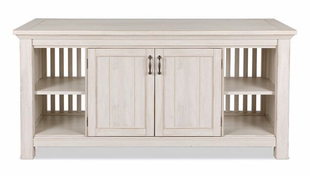 Whitewashed wood kitchen island with slatted sides, open cubby storage, and cabinet doors