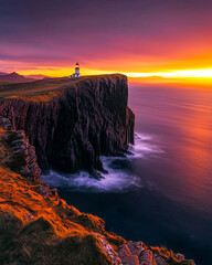 Towering cliffs and a solitary lighthouse overlooking the ocean at intense sunset, with glowing sky and soft waves creating a dramatic coastal atmosphere