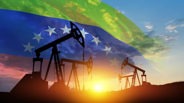 The change in oil prices. Oil price cap concept. Oil drilling derricks at desert oilfield with Venezuela flag. Crude oil production from the ground. Petroleum production.