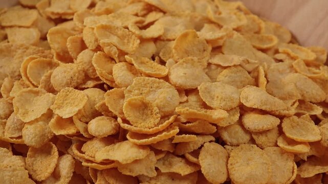 Cornflakes in a wood bowl