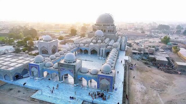 Aerial Drone View of Grand Mosque Allahabad in Kandiaro Sindh Featuring 101 Domes and Traditional Islamic Architecture at Sunset