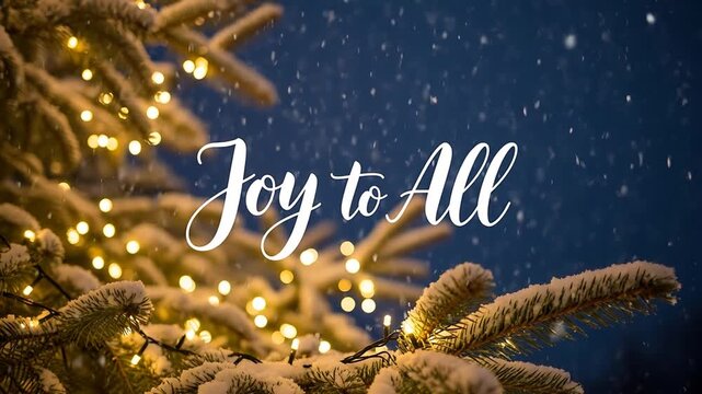 Close-up of snow-covered pine branches adorned with warm string lights, featuring the festive message 'Joy to All' against a dark, snowy night sky.