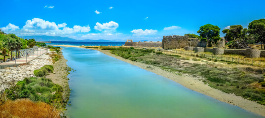 Scenic panorama of coast with ruins ancient fortress and promenade near Tangier. Morocco, North Africa