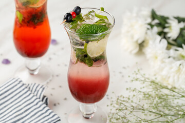 Colorful Layered Fruit Mocktails with Mint and Ice © Adil