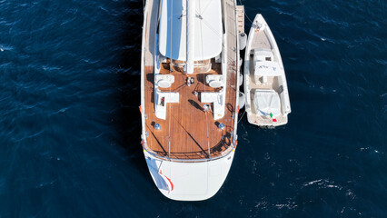 Aerial drone photo of beautiful sail boat anchored in deep blue Aegean Sea © aerial-drone