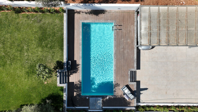 Aerial drone top view photo of luxury tropical villa with large pool located in mediterranean destination