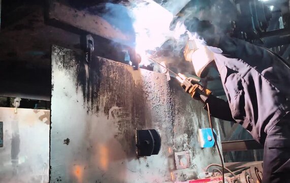 Welding industrial heavy-duty hinge for coal damper system, left view.