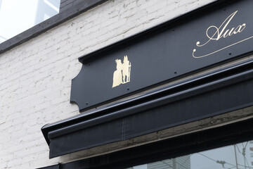 Naklejka premium retro-antique pastry shop sign detail at Aux Merveilleux de Fred, 224 Queen St W, Toronto