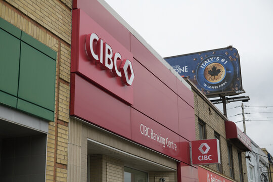 exterior building facade and sign of CIBC Branch with ATM at 1529 Bayview Av, Toronto