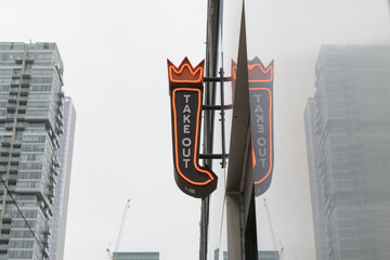 Obraz premium shaped logo sign wall mounted on the exterior of Salad King, a Thai restaurant, located at 224 Queen St W (shown side facing McCaul St), Toronto