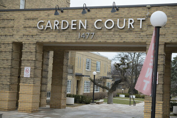 Fototapeta premium exterior detail building and sign of Leaside Apartments Courtyard/Garden Court at 1477 Bayview Av, East York, Toronto