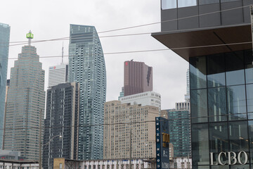 Fototapeta premium exterior building and sign of LCBO, a liquor store chain, located here at 15 Cooper St, Sugar Wharf Condominiums, seen from Queens Quay E, Toronto