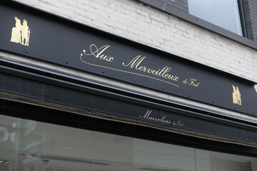 Fototapeta premium exterior building and sign of Aux Merveilleux de Fred, a pastry shop, located at 224 Queen St W, Toronto