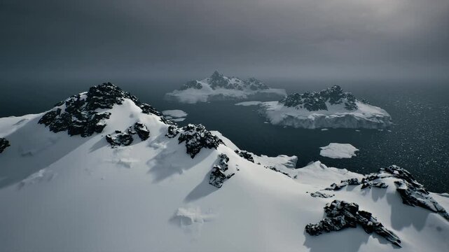 sunlit summit ridge opens to islands, warm pale light softens snowy peaks and reveals distant frozen archipelago, uplifting scene for adventure, research,