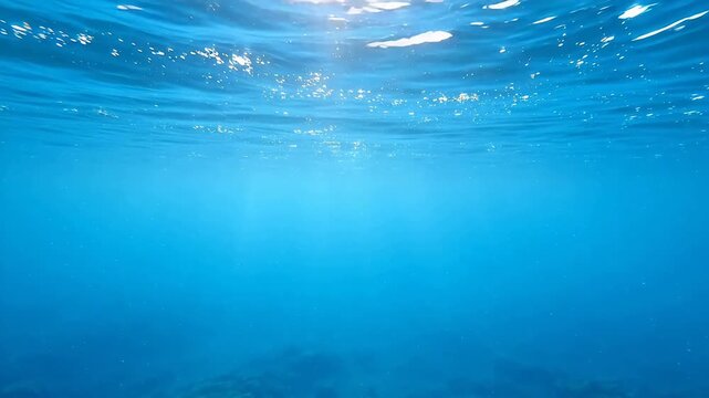 Underwater view of sunlight through water
