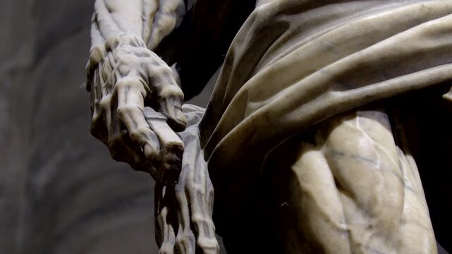 Italy. Milan Cathedral. 10-05-2022. Saint Bartholomew Flayed hand detail. Video 4K