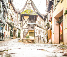 Eguisheim village street with half timbered houses