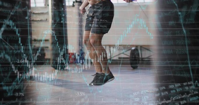 Man initiating jump-rope workout by swinging rope in gym, animated finance charts tracking stats